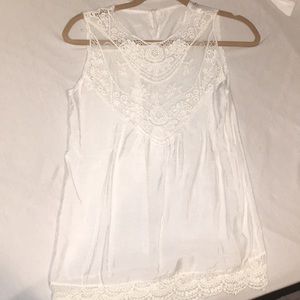 White sleeveless blouse